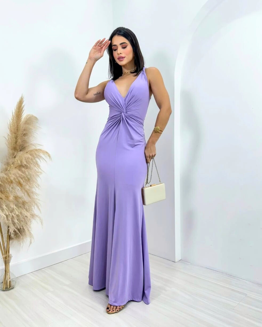 Vestilo lila claro con espalda abierta. Ruth